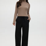 Black straight leg pull-on pants with elastic waistband and drawcord, featuring side pockets.