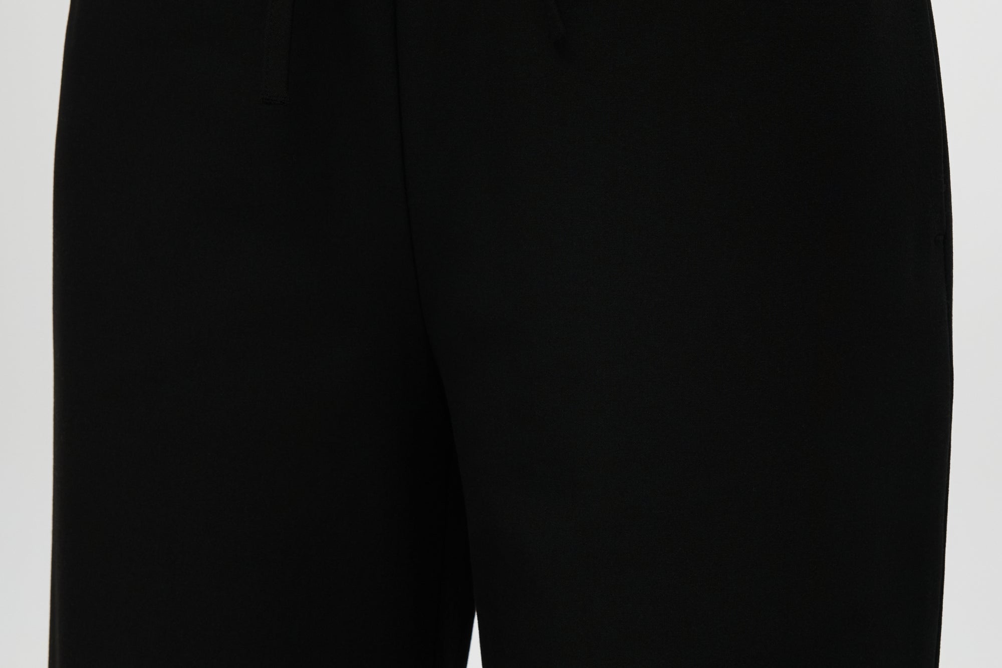 Black Straight Leg Pull-On Pants with elastic waistband, drawcord, and side pockets by Hilary Radley.
