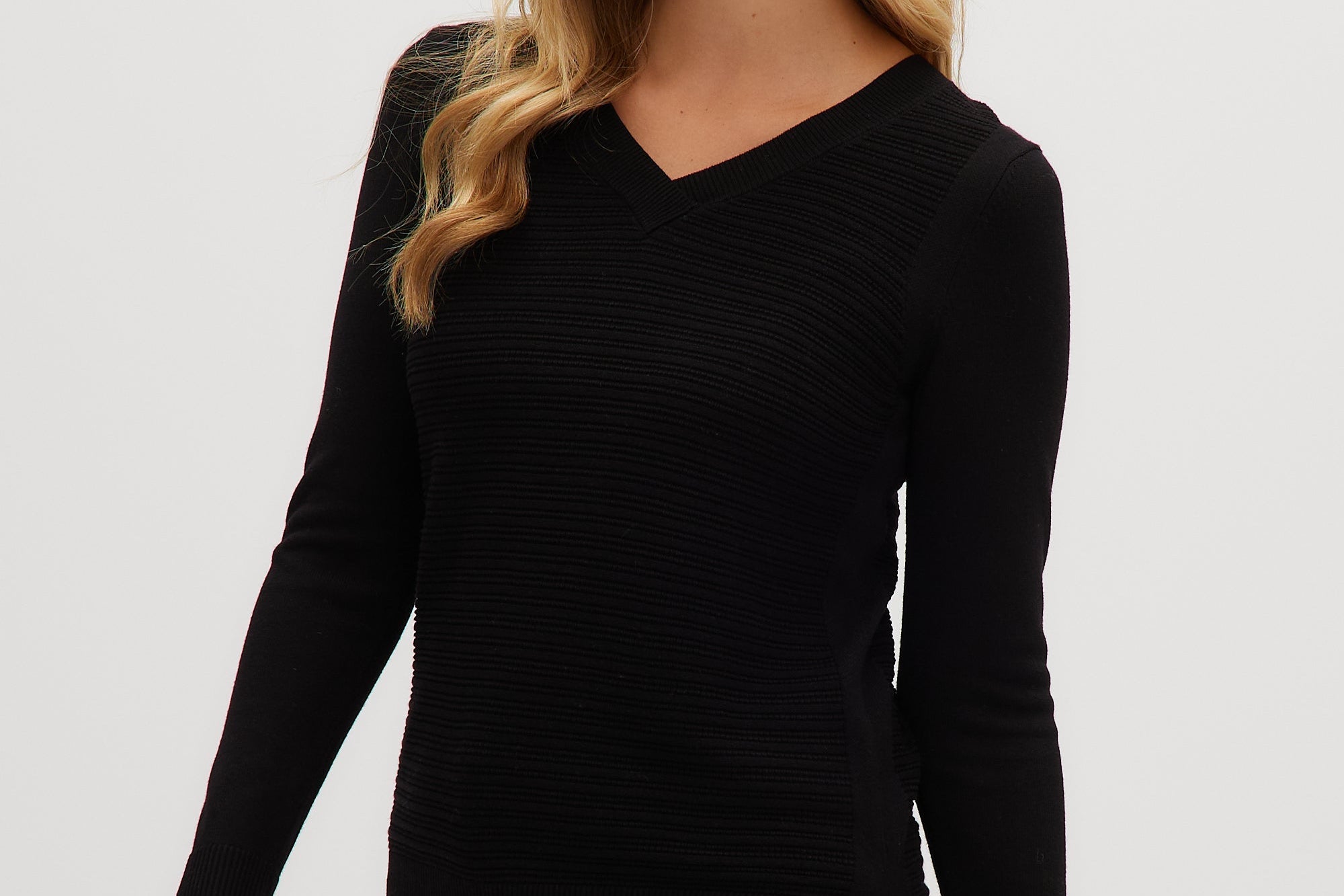 Black V-neck sweater side