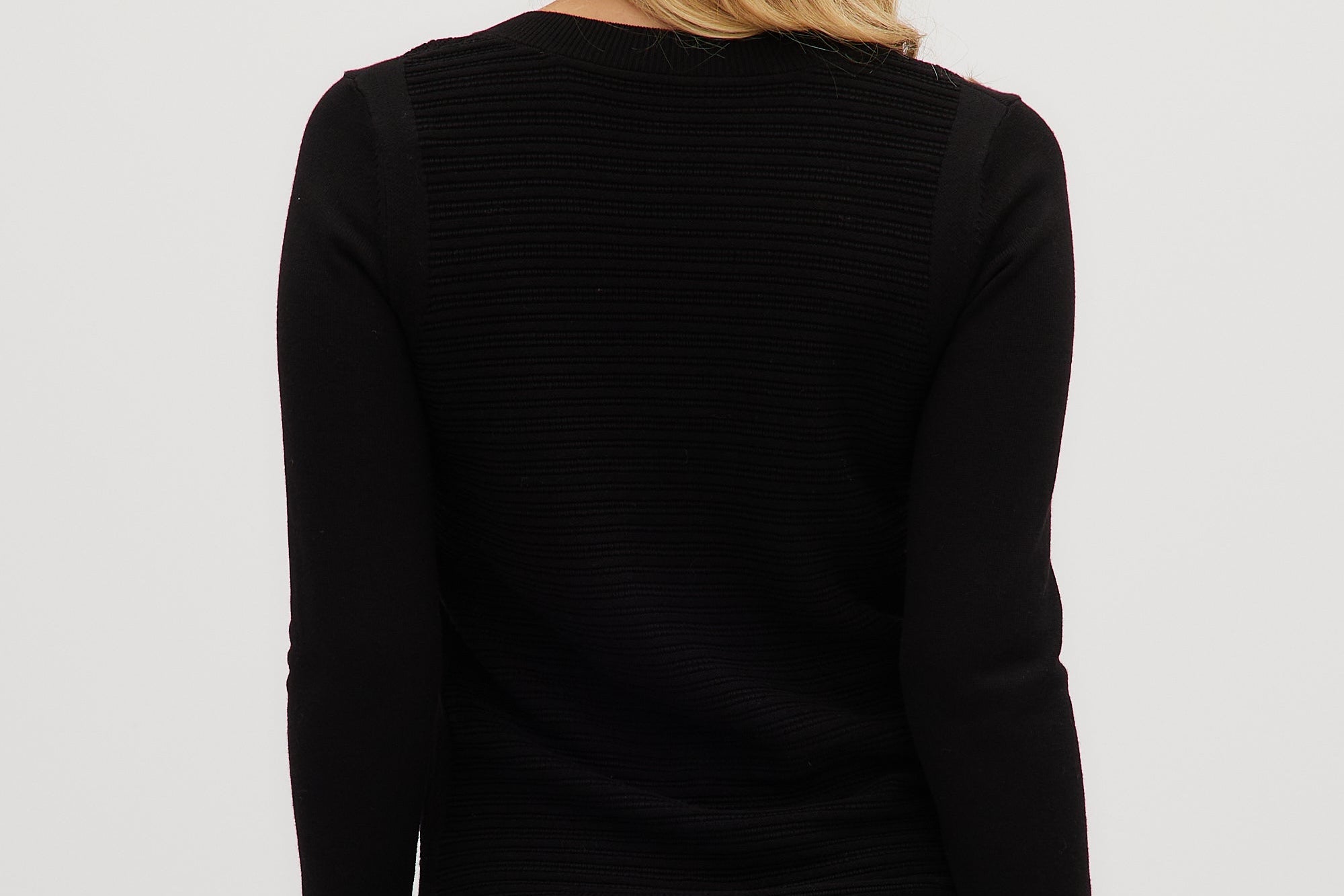 Black V-neck sweater back