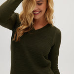 Olive V-neck sweater close up