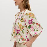 Cream Floral Linen Blend Blouse featuring puff sleeves and button-front closure by Hilary Radley.