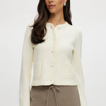 Cream Knit Round Collar Cardigan featuring patch pockets, available from Hilary Radley.