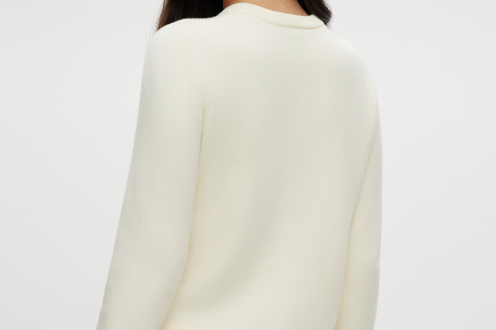 Cream Knit Round Collar Cardigan featuring patch pockets, available at Hilary Radley.