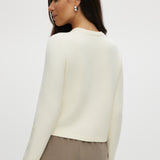Cream Knit Round Collar Cardigan featuring patch pockets, available at Hilary Radley.