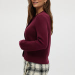 Burgundy Round Collar Knit Cardigan featuring patch pockets, available from Hilary Radley.