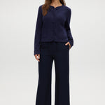 Navy Round Collar Knit Cardigan featuring long sleeves and front pockets by Hilary Radley.