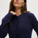 Navy Round Collar Knit Cardigan featuring long sleeves and front pockets, available from Hilary Radley.