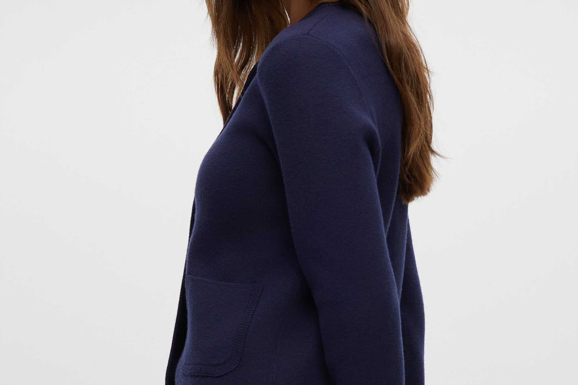 Navy Round Collar Knit Cardigan featuring long sleeves and front pockets by Hilary Radley.