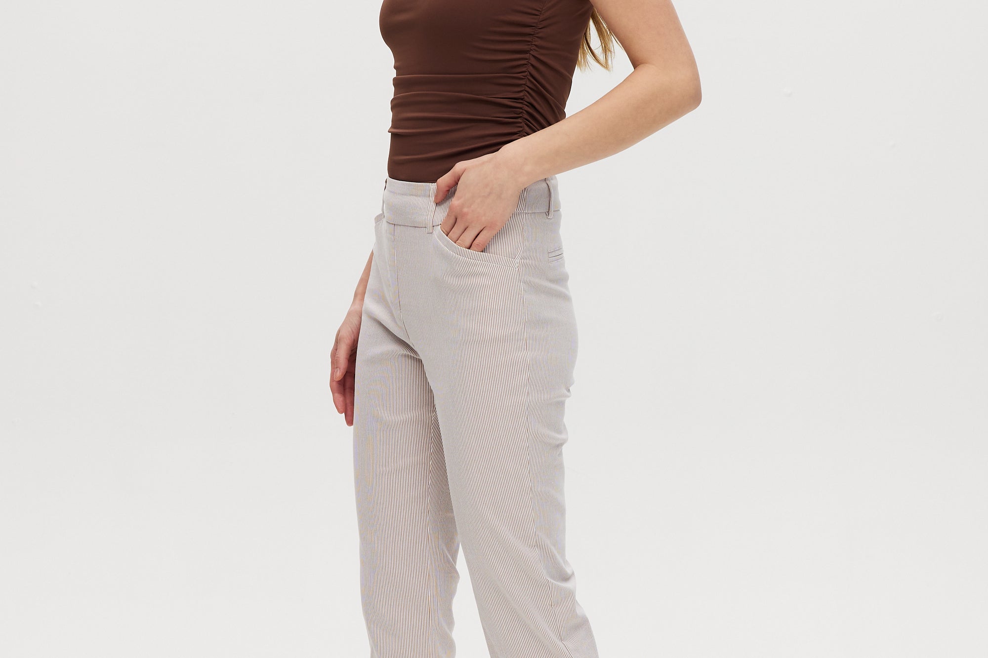 Camel striped super stretch pull-on capri featuring tummy control and functional pockets by Hilary Radley.