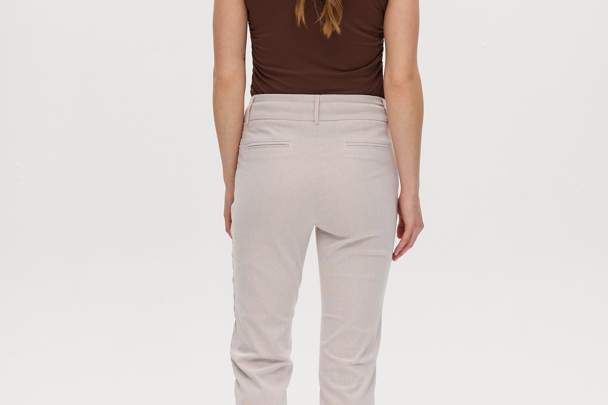 Camel striped super stretch pull-on capri with tummy control and functional pockets by Hilary Radley.