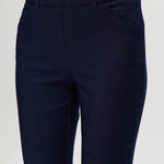 Navy Super Stretch Pull-On Capri Pants featuring functional front pockets and faux back pockets by Hilary Radley.