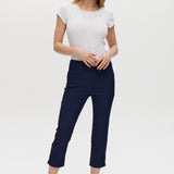 Navy capri pants, super stretch pull-on with functional front pockets and faux back pockets.