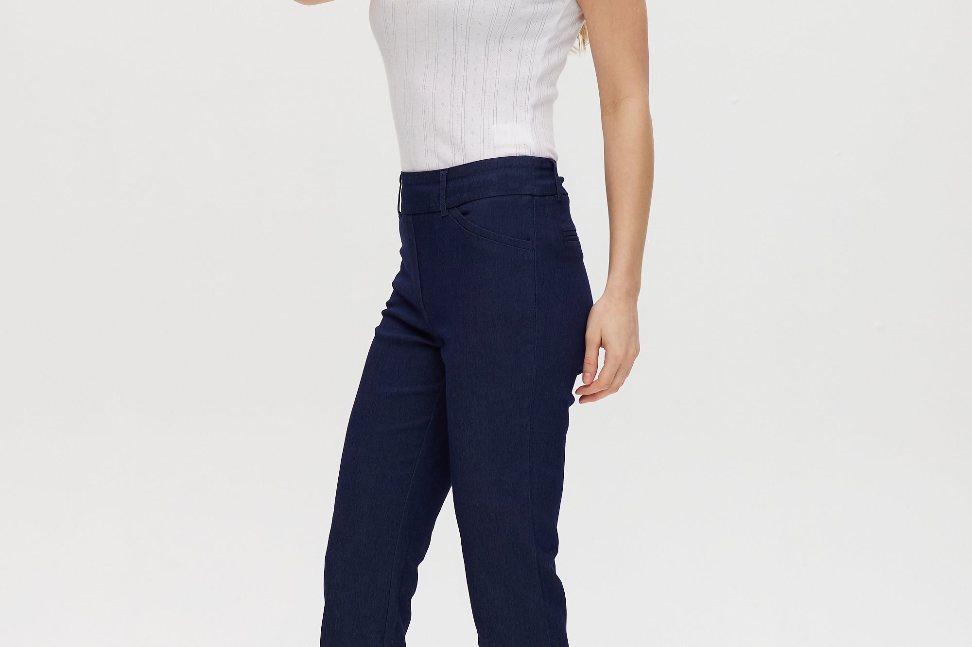 Navy Super Stretch Pull-On Capri with functional front pockets and faux back pockets by Hilary Radley.