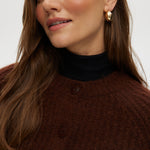 Coffee shaker stitch raglan cardigan featuring ribbed cuffs and hem by Hilary Radley.