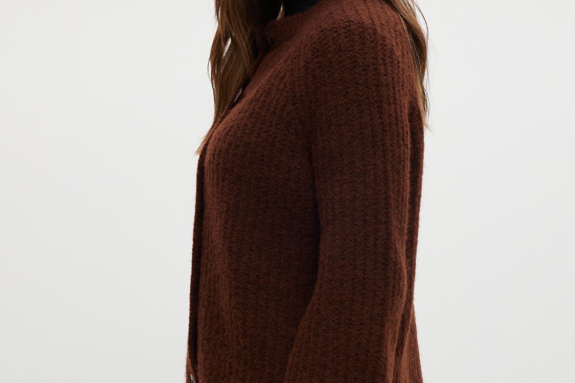 Coffee shaker stitch raglan cardigan with ribbed cuffs and hem by Hilary Radley.