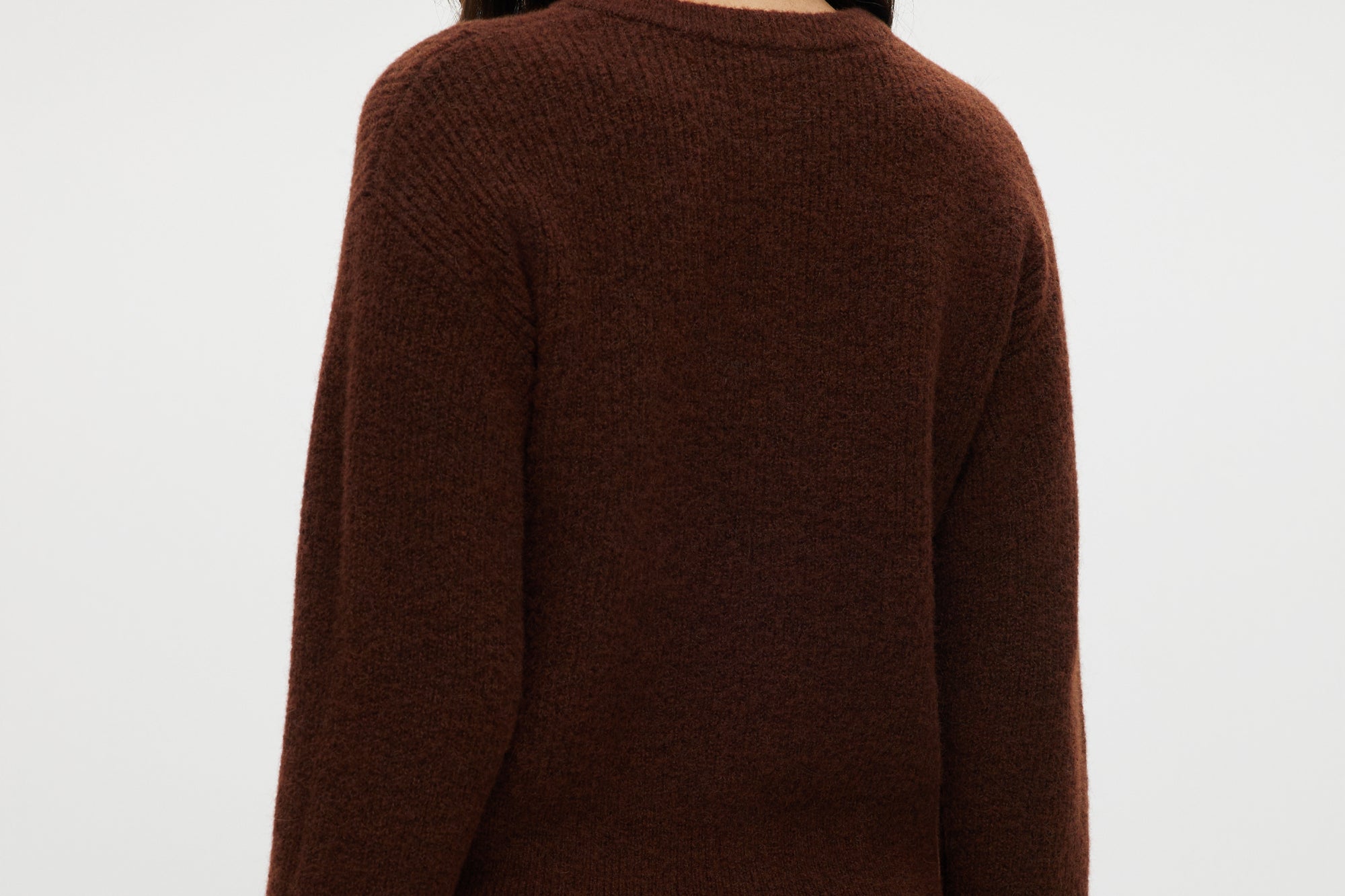 Coffee Shaker Stitch Crew Neck Cardigan in brown featuring a button-front and long sleeves by Hilary Radley.