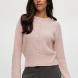 Pink shaker stitch cardigan with crew neck and button-front closure.
