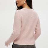 Pink shaker stitch crew neck cardigan featuring a button-front closure by Hilary Radley.