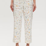 White High-Rise Floral Straight Leg Pant with button-front closure and pockets, sold by Hilary Radley.