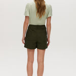 Olive high-rise stretch shorts featuring button closure, front patch pockets, and textured fabric by Hilary Radley.