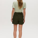Olive high-rise stretch shorts featuring button closure, front patch pockets, and textured fabric by Hilary Radley.