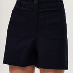 Navy high-rise stretch shorts featuring a structured waistband and functional pockets by Hilary Radley.