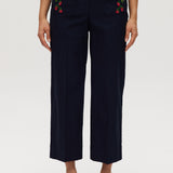 Navy high-rise straight leg pants featuring embroidery and front patch pockets by Hilary Radley.
