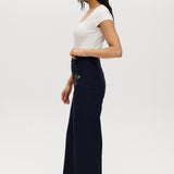 Navy high-rise straight leg pants featuring embroidery and front patch pockets by Hilary Radley.