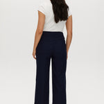 Navy high-rise straight leg pants featuring embroidery and front patch pockets by Hilary Radley.