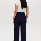 Navy high-rise straight leg pants featuring embroidery and front patch pockets by Hilary Radley.