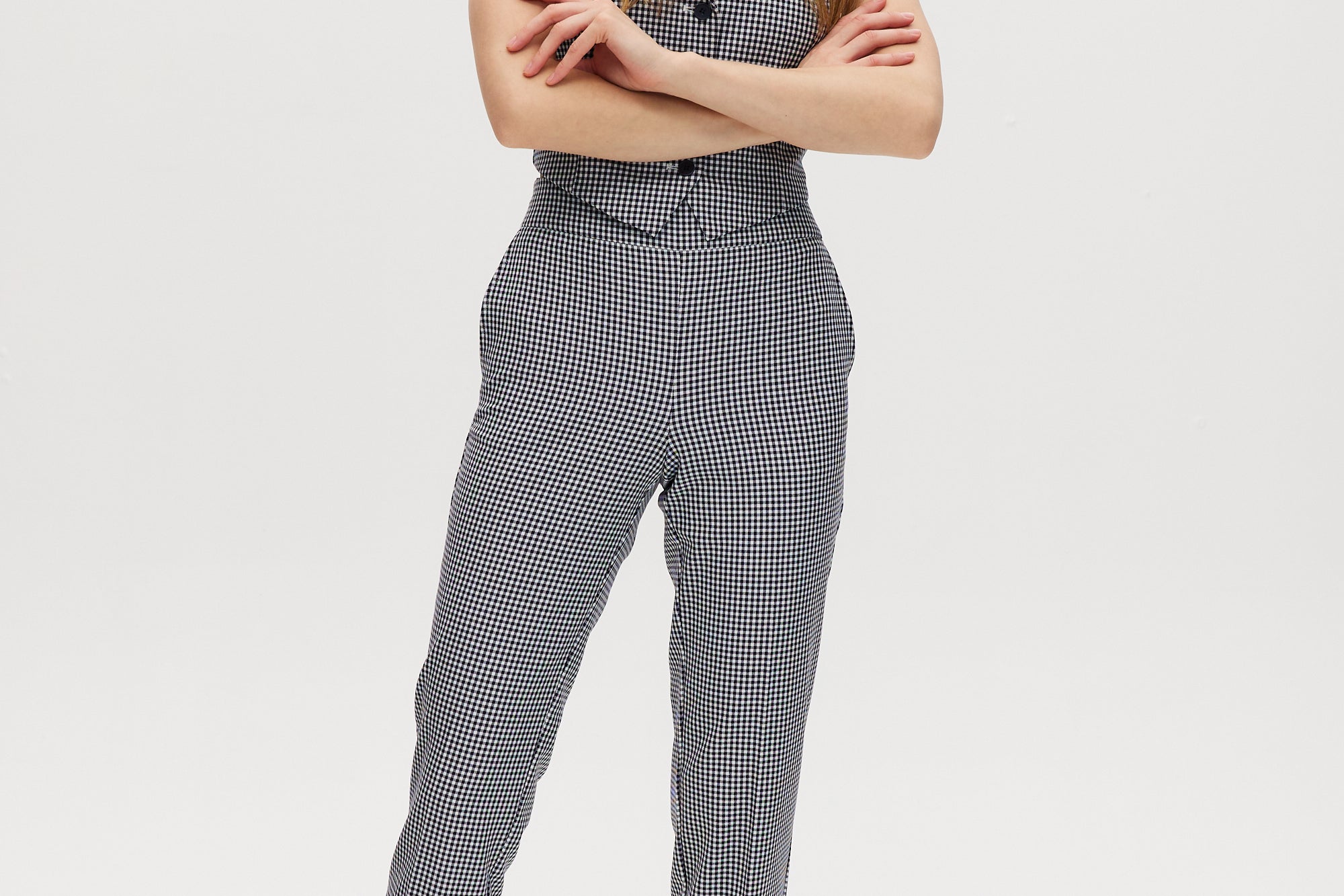 Navy checked slim leg pant and vest set with pull-on waistband and button-front vest.