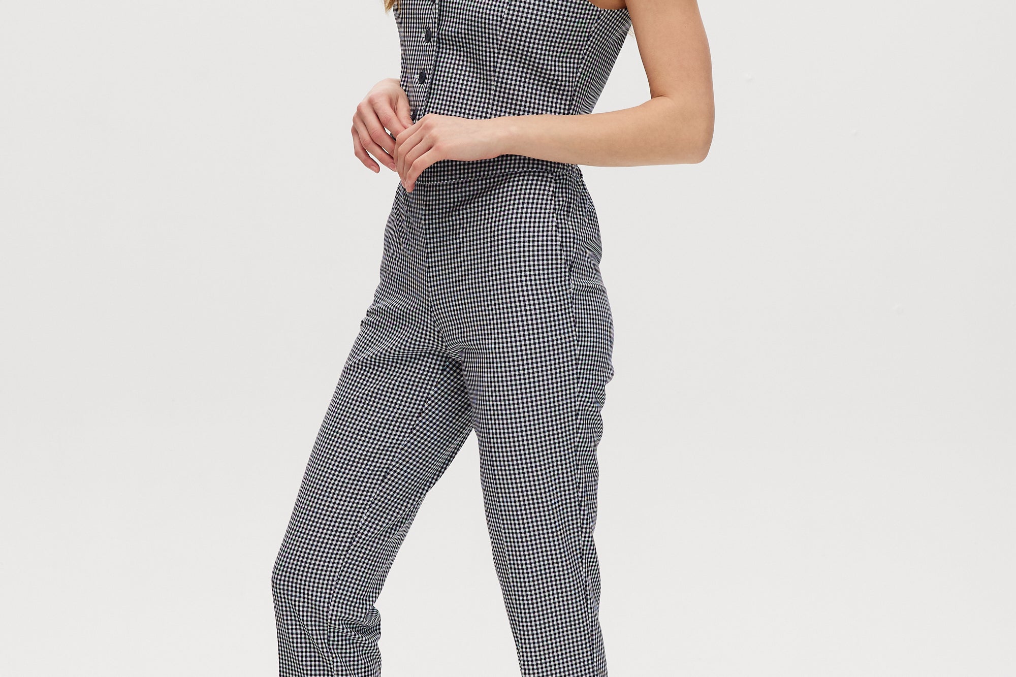 Navy checked slim leg pant and vest set featuring a pull-on waistband and button-front vest by Hilary Radley.