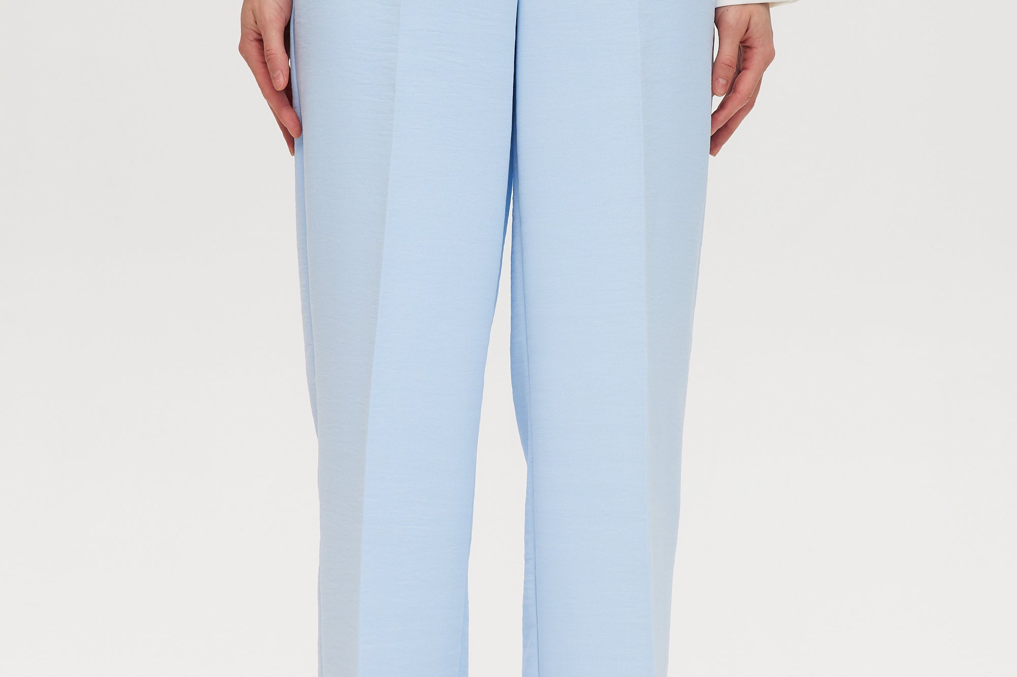 Sky wide-leg tailored pull-on pant with button closure and functional pockets by Hilary Radley.