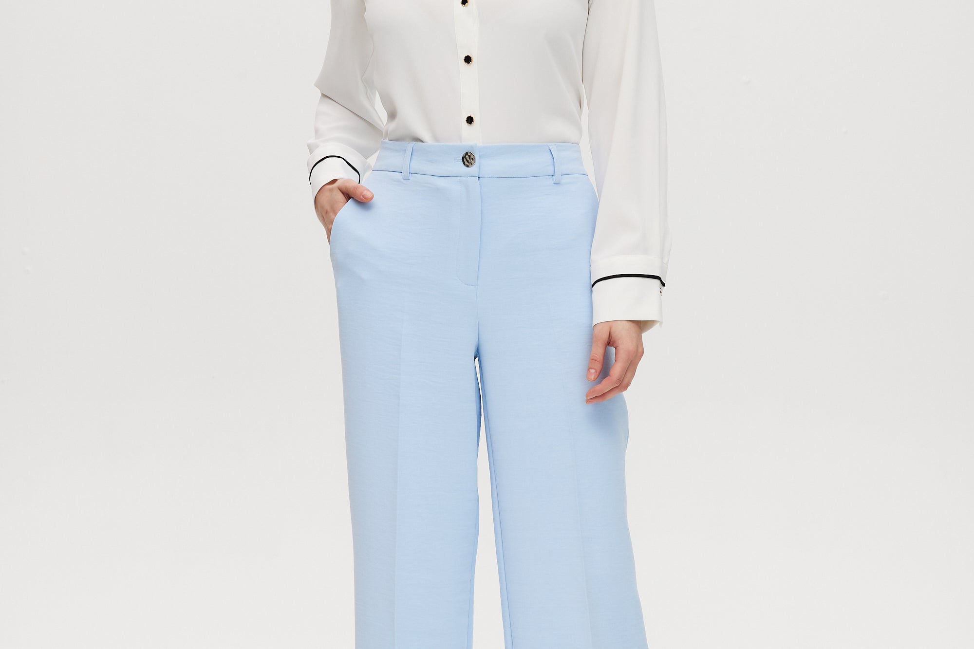 Sky wide-leg tailored pull-on pant with button closure and functional pockets.