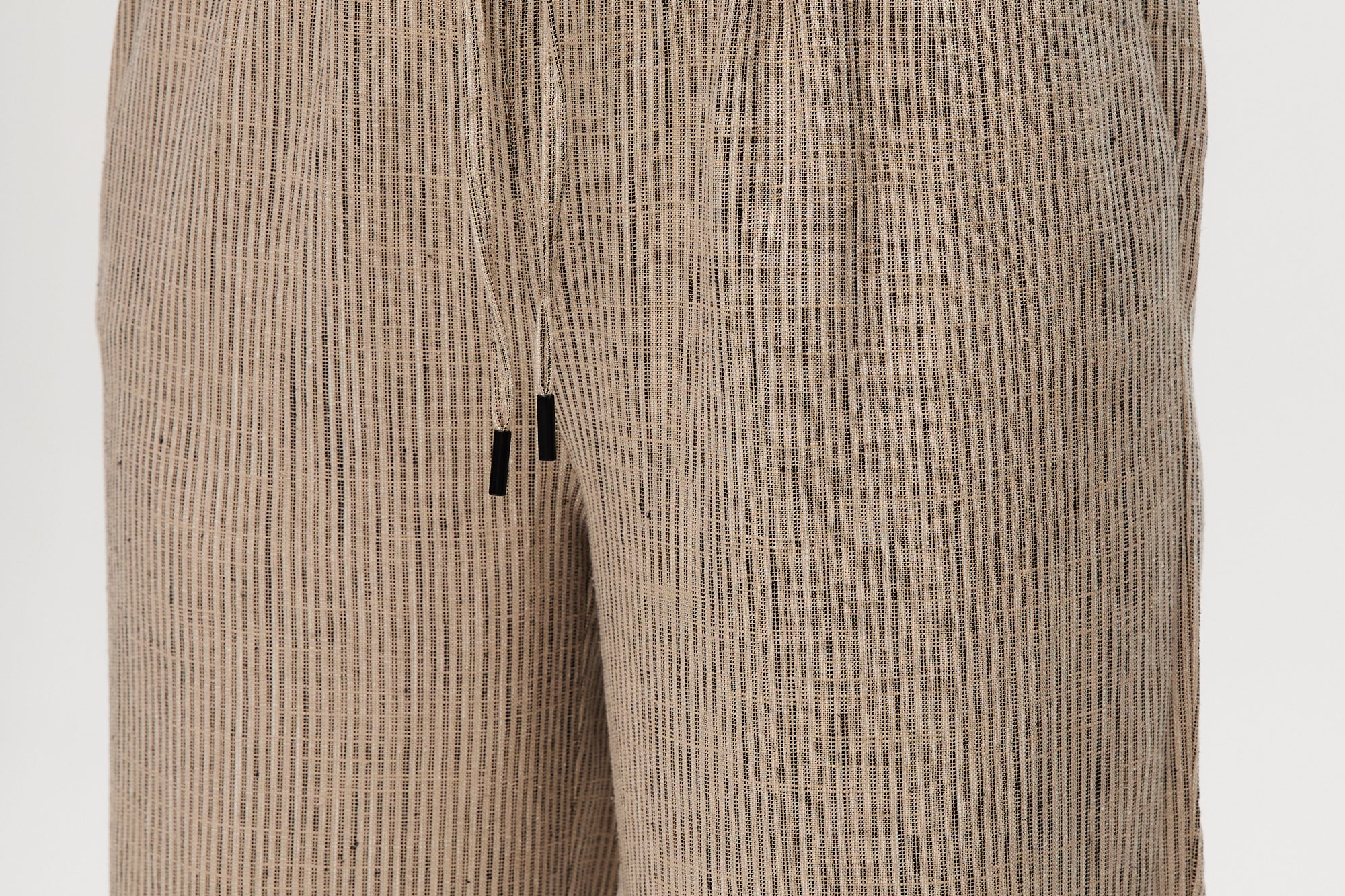 Beige Yarn-Dye Linen Stripe Pull-On Pant featuring an elastic waistband, perfect for pairing with a matching blazer by Hilary Radley.