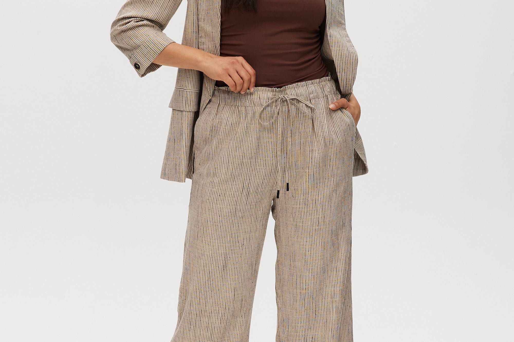 Beige yarn-dye linen stripe pants with elastic waistband and matching blazer