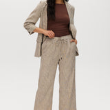 Beige yarn-dye linen stripe pants with elastic waistband and matching blazer