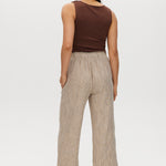 Beige yarn-dye linen stripe pull-on pants featuring an elastic waistband, available from Hilary Radley.