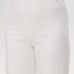 Off-White embroidered cotton straight leg pants featuring a pull-on waistband and hem embroidery by Hilary Radley.