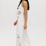 Off-White embroidered cotton straight leg pants featuring a pull-on waistband and intricate hem embroidery by Hilary Radley.