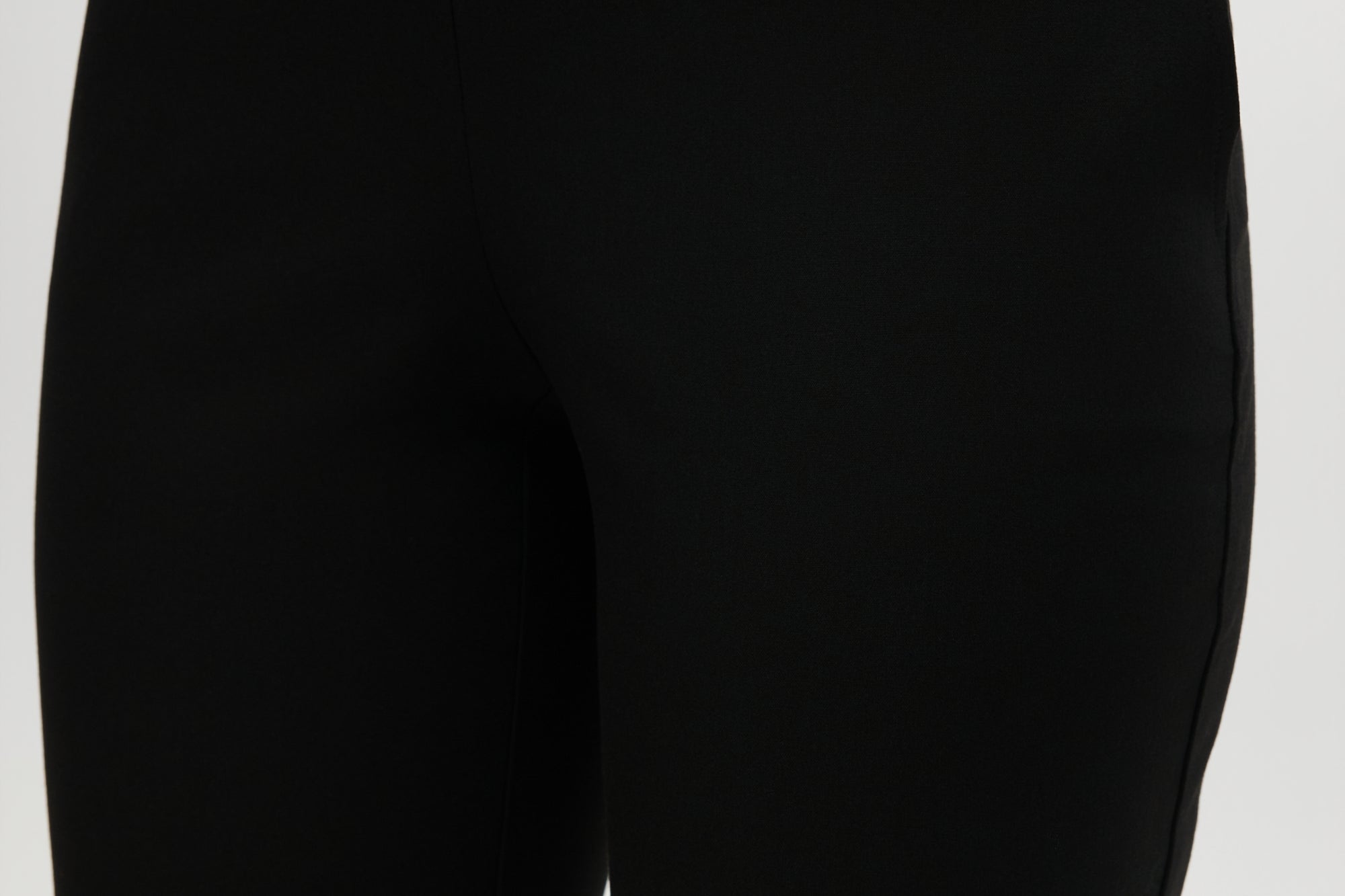 Black Skinny Leg Pull-On Pant featuring an elastic waistband and side pockets by Hilary Radley.