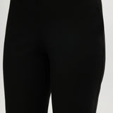 Black Skinny Leg Pull-On Pant featuring an elastic waistband and side pockets by Hilary Radley.