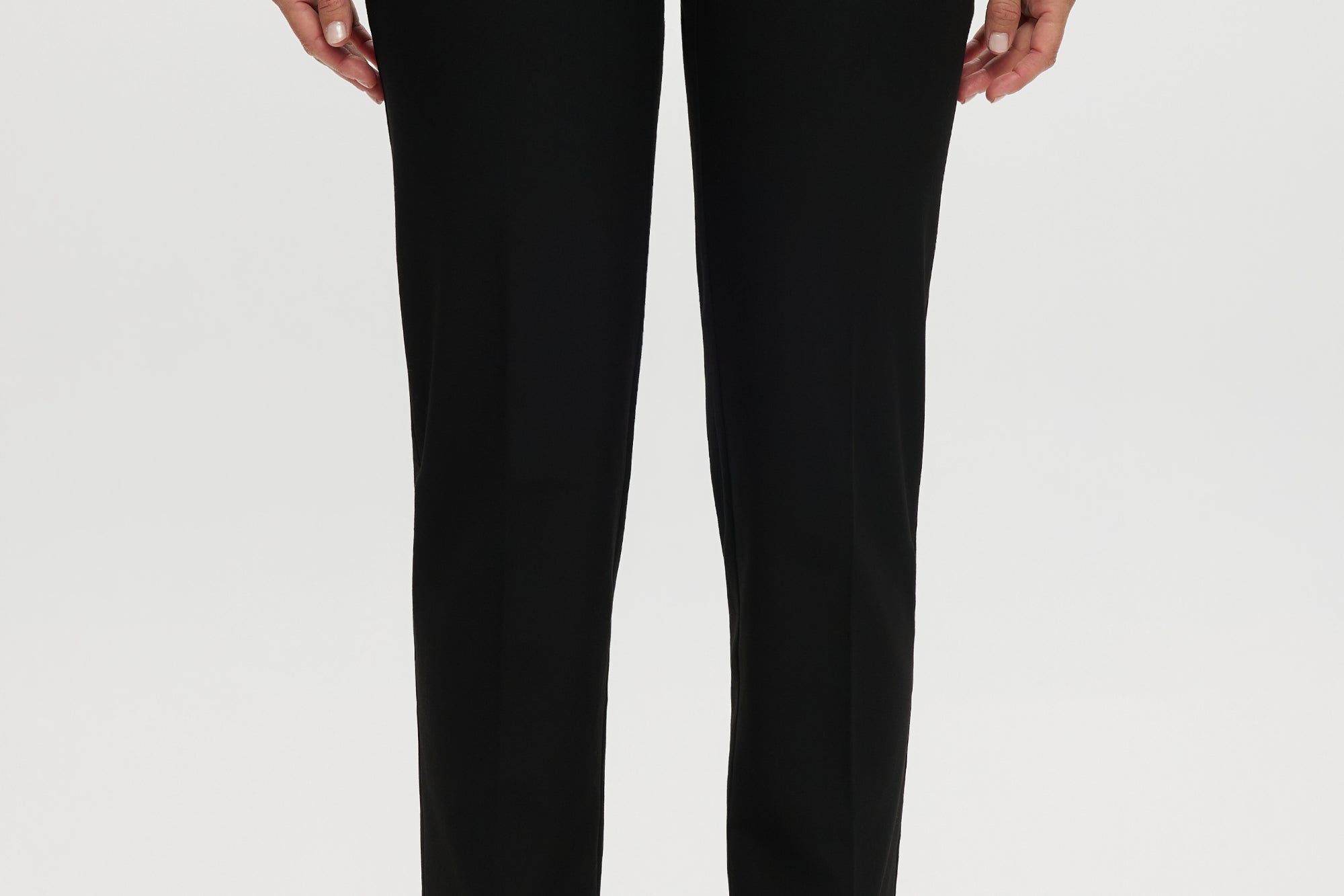 Black skinny leg pull-on pant featuring an elastic waistband and side pockets by Hilary Radley.