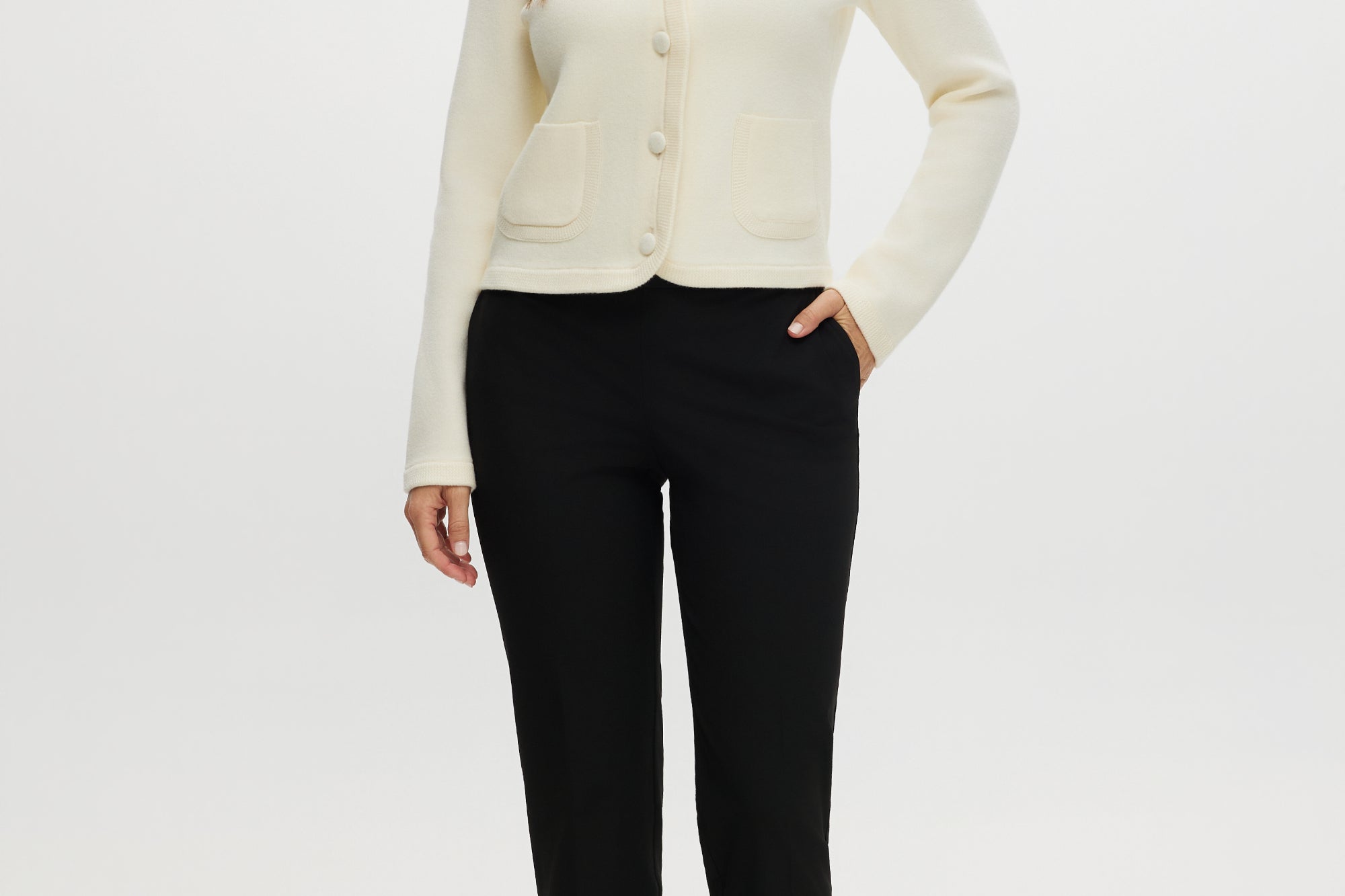 Black skinny leg pull-on pant with elastic waistband and side pockets
