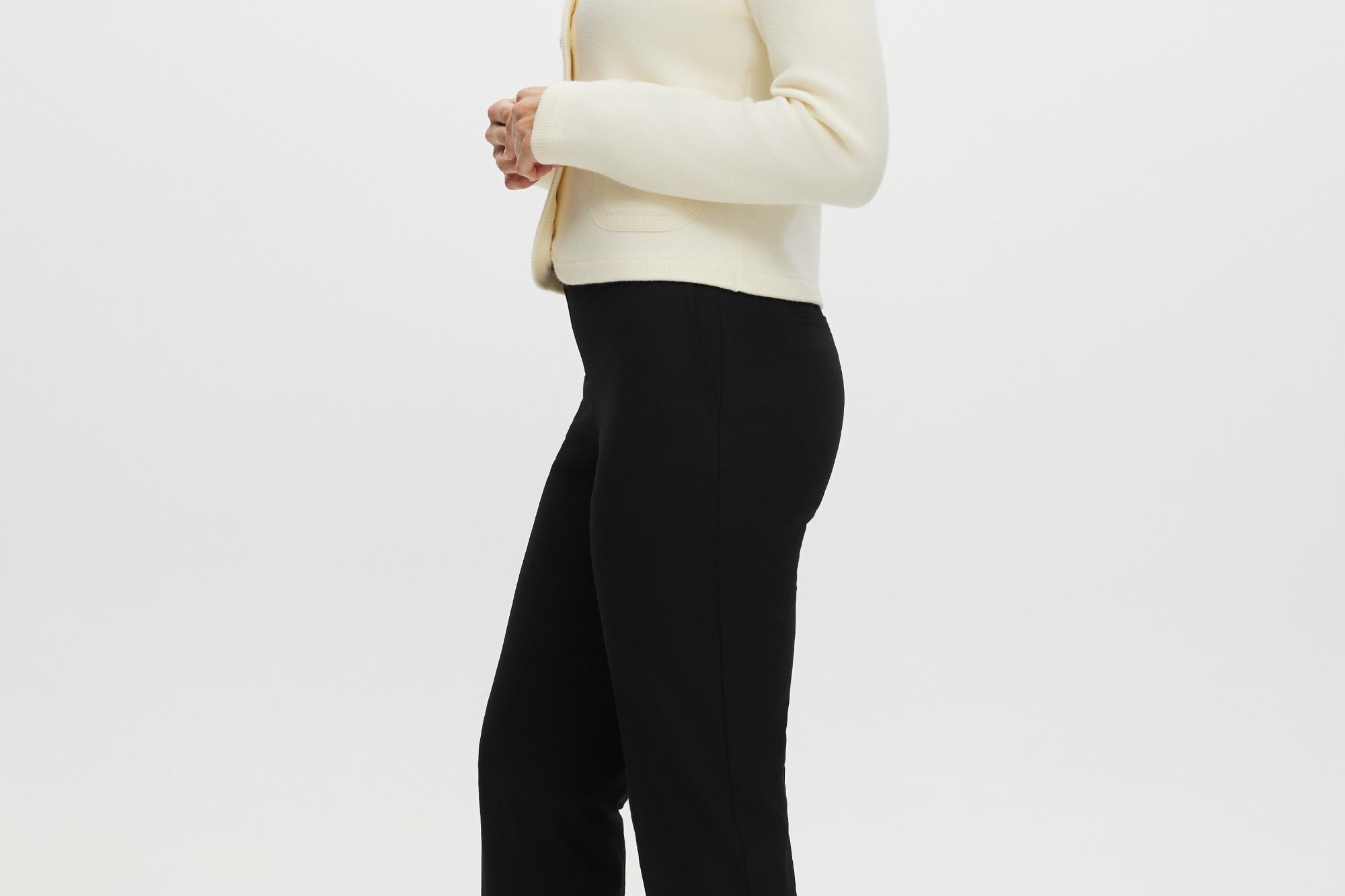 Black skinny leg pull-on pant featuring an elastic waistband and side pockets by Hilary Radley.
