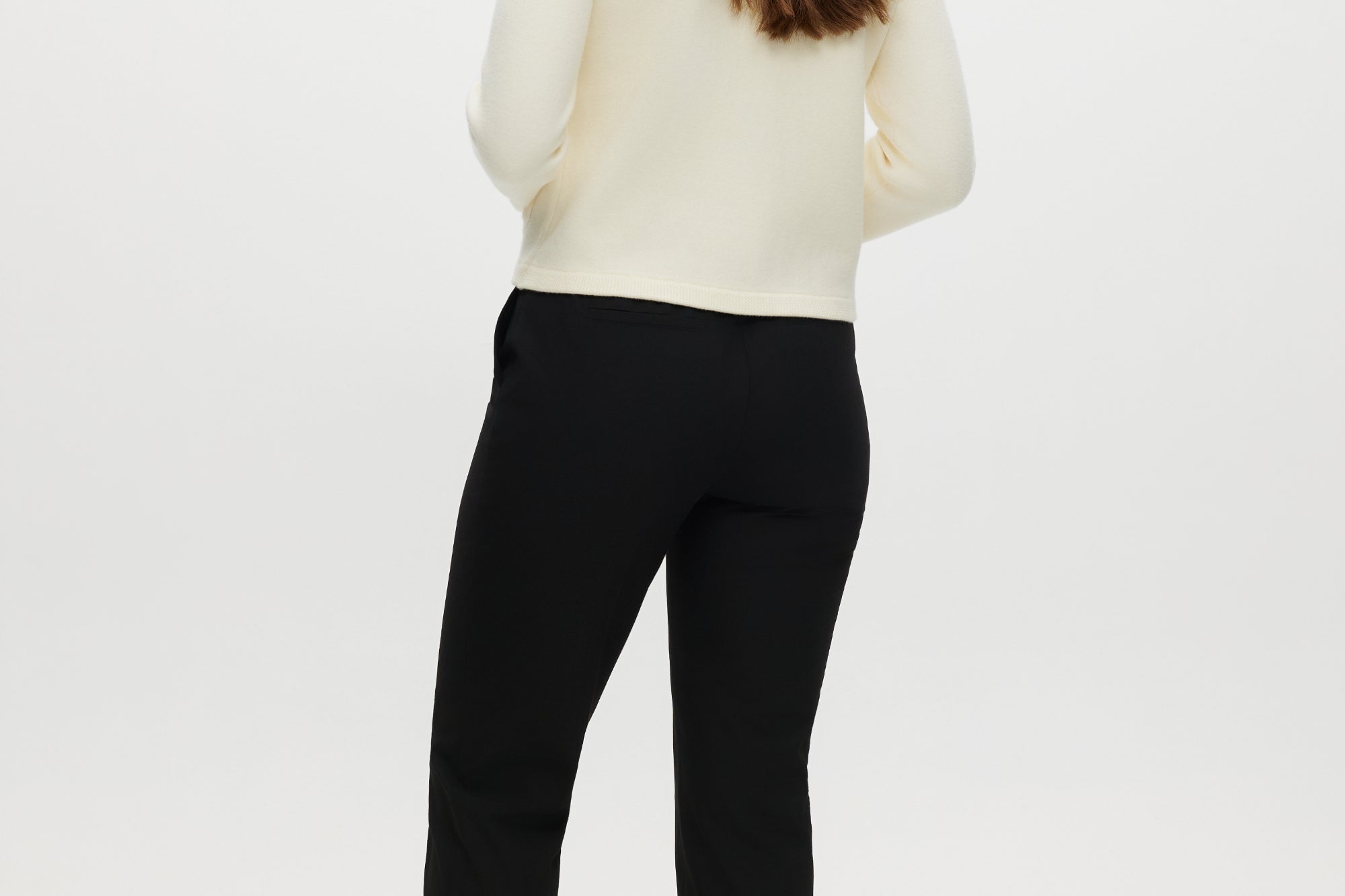 Black skinny leg pull-on pant featuring an elastic waistband and side pockets by Hilary Radley.