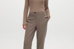 Brown herringbone straight leg pants with textured knit and pockets.