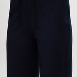 Navy pull-on straight leg pants featuring an elastic waistband and side pockets by Hilary Radley.
