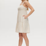 Beige Linen Blend Tiered Midi Dress featuring a tiered skirt, adjustable straps, and smocked back by Hilary Radley.